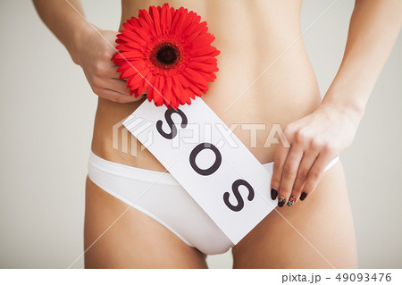 Woman Health Problem. Closeup Of Female With Fit Slim Body In Panties Holding White Card With Word Woman Health Problem. Closeup Of Female With Fit Slim Body In Panties Holding White Card With Word 49093476
