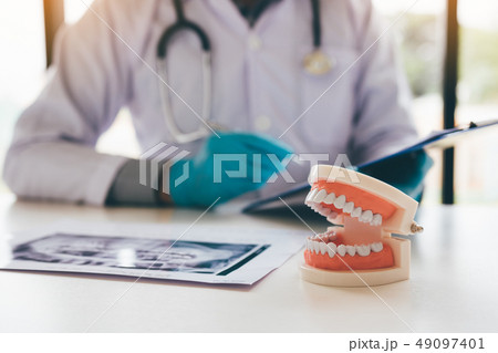 Dentists are discussing dental problems at report 49097401