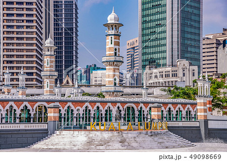 Kuala Lumpur sign with city buildings 49098669
