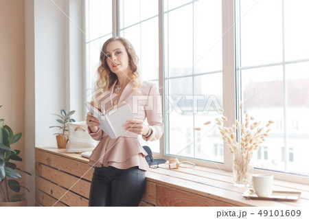 Portrait of young business woman or freelancer imagemaker Portrait of young business woman or freelancer imagemaker 49101609