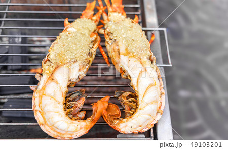 lobster grilled on hot charcoal grill 49103201