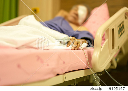 Senior patient with pulse gauge for heartbeat measuring on patient finger. Senior patient with pulse gauge for heartbeat measuring on patient finger. 49105167