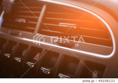 Car conditioner. The air flow inside the car. Detail interior. Air ducts, deflectors on the car Car conditioner. The air flow inside the car. Detail interior. Air ducts, deflectors on the car 49106131