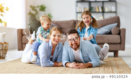 happy family mother father and kids at home on 49110324