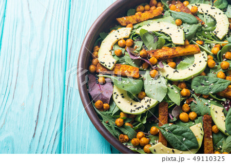 Baby spinach salad with sweet potato , chickpeas Baby spinach salad with sweet potato , chickpeas 49110325
