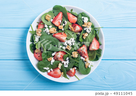 Strawberry salad with spinach , cheese and walnut Strawberry salad with spinach , cheese and walnut 49111045