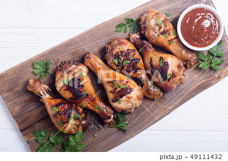 Grilled chicken legs with tomato sauce BBQ food Grilled chicken legs with tomato sauce BBQ food 49111432
