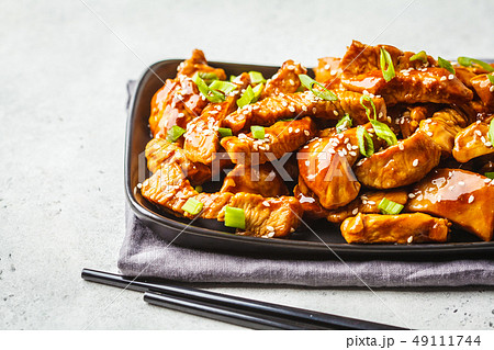 Teriyaki chicken with sesame, green onion Teriyaki chicken with sesame, green onion 49111744
