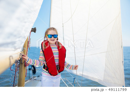 Kids sail on yacht in sea. Child sailing on boat. 49111799