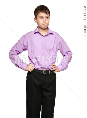 Boy posing on white background, black trousers and Boy posing on white background, black trousers and 49112201