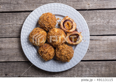 Traditional Austrian plum dumplings Traditional Austrian plum dumplings 49113115