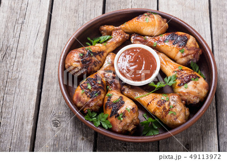 Grilled chicken legs with tomato sauce BBQ food Grilled chicken legs with tomato sauce BBQ food 49113972