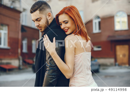 couple in a town couple in a town 49114998