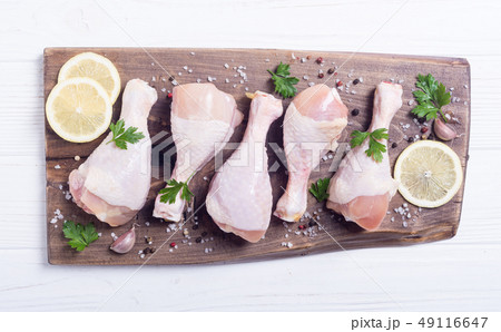Raw chicken legs with spices and parsley. Food Raw chicken legs with spices and parsley. Food 49116647
