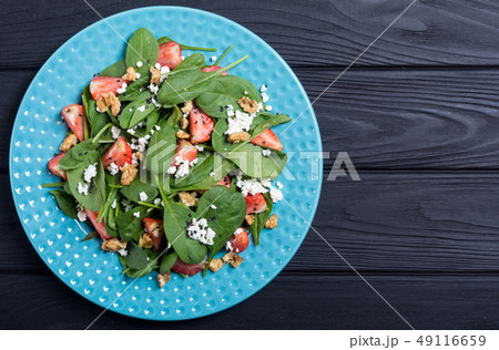 Strawberry salad with spinach , cheese and walnut Strawberry salad with spinach , cheese and walnut 49116659