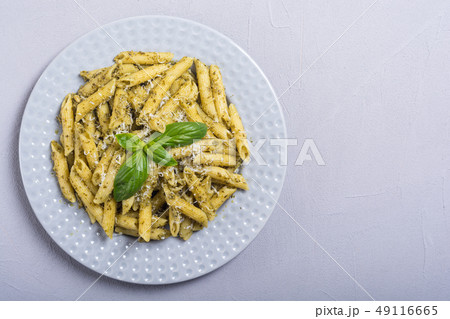 Italian penne pasta with sauce pesto Italian penne pasta with sauce pesto 49116665