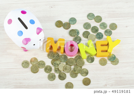 word MONEY over piggy bank with stacking coins 49119181