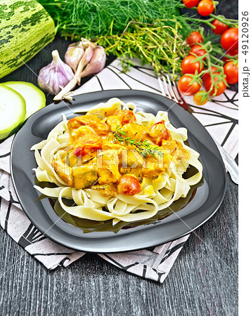 Pasta with goulash in plate on table 49120926