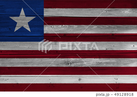 Liberia flag painted on old wood plank 49128918