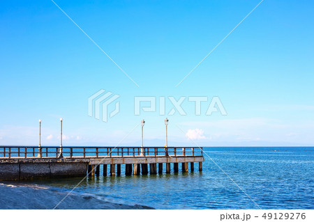 Wooden pier and blue sea 49129276