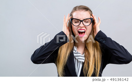Young woman feeling stressed Young woman feeling stressed 49136142