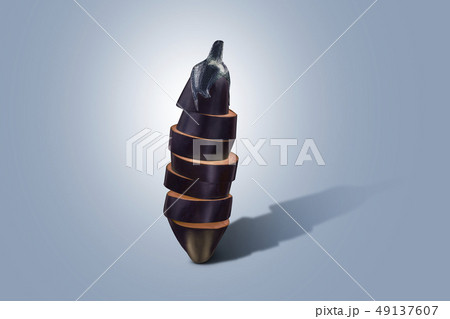 Eggplant sliced vertically on a blue background. Minimal vegetable concept. Eggplant sliced vertically on a blue background. Minimal vegetable concept. 49137607