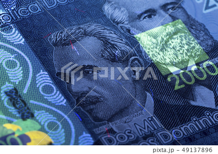 Dominican Pesos in UV rays  49137896