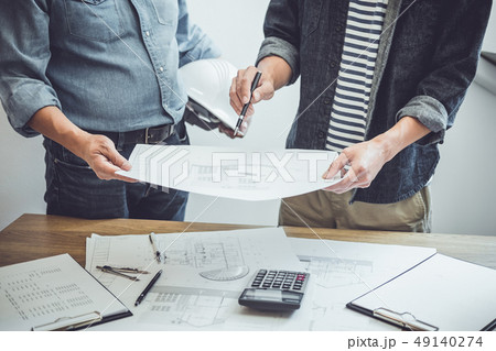 Architecture Engineer Teamwork Meeting, Drawing and working for 49140274