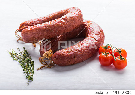Food, national cuisine and delicious concept - Close up of traditional Kazakh horse meat sausage 49142800