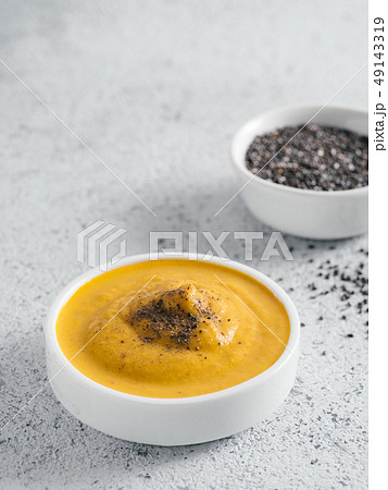 Vegan creamy cheddar cheese sauce with chia seeds Vegan creamy cheddar cheese sauce with chia seeds 49143319
