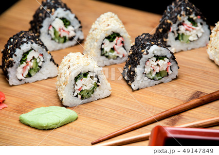 Sushi rolls with crab meat and sesame seeds. Sushi rolls with crab meat and sesame seeds. 49147849