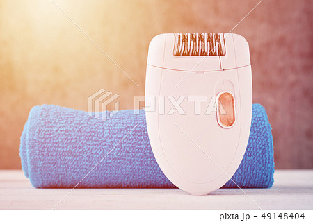Close up of epilator on background with towel 49148404