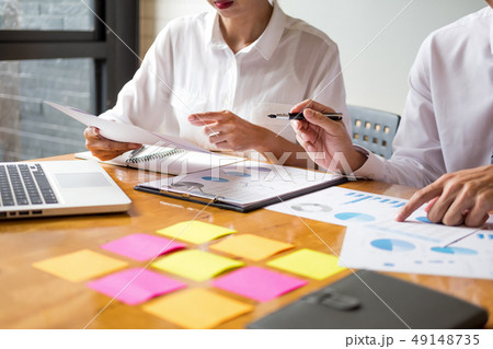 Business team data analyzing income charts 49148735
