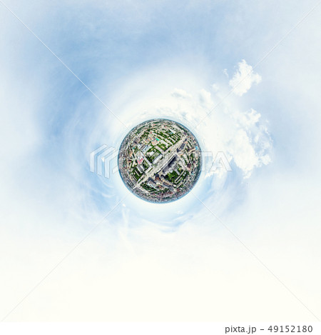 Aerial city view with crossroads and roads, houses, buildings, parks and parking lots. Sunny summer 49152180