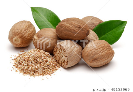 Whole and grated nutmeg with leaves isolated Whole and grated nutmeg with leaves isolated 49152969