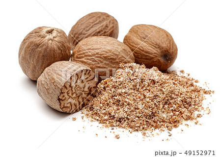 Whole and grated nutmeg isolated on white 49152971