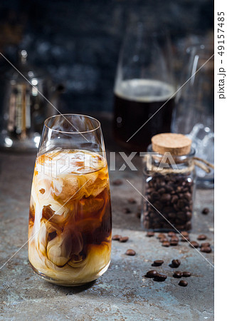Ice coffee in a tall glasses 49157485