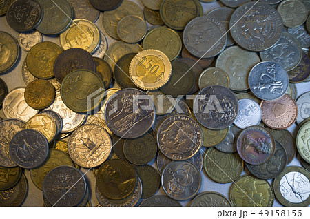 Collection of different coins background. Close 49158156