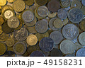 Collection of different coins background. Close 49158231