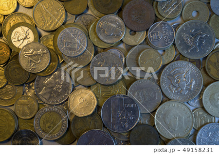 Collection of different coins background. Close 49158231