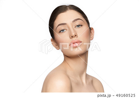 Beautiful model with naturale make up, plump lips posing. Beautiful model with naturale make up, plump lips posing. 49160525