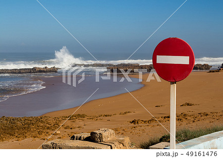 No entry sign and the Atlantic ocean, Morocco No entry sign and the Atlantic ocean, Morocco 49161476