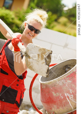 Strong woman working with construction site 49161847