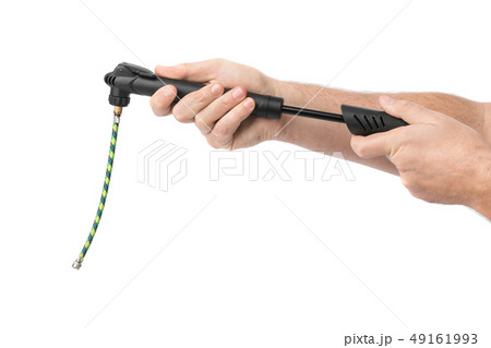 Hands with bicycle pump 49161993
