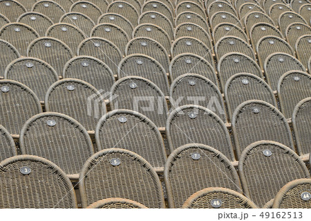 Rows of seats in open air concert hall auditorium 49162513