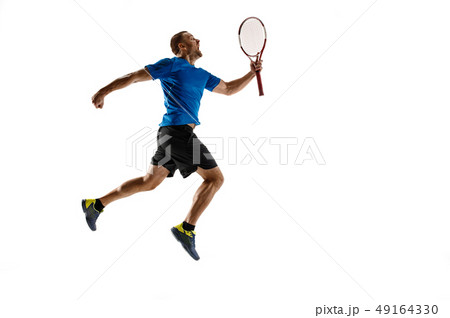Portrait of a handsome male tennis player celebrating his success isolated on a white background Portrait of a handsome male tennis player celebrating his success isolated on a white background 49164330