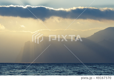 Rays of the sun over the sea 49167370