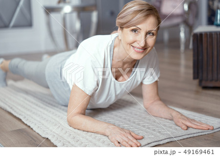 Yoga Classes at Home Beautiful Women Over 50 Years. Yoga Classes at Home Beautiful Women Over 50 Years. 49169461