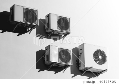 White air conditioners on the white wall White air conditioners on the white wall 49171303