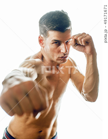 young handsome agressive man boxing isolared on white background, lifestyle sport people concept young handsome agressive man boxing isolared on white background, lifestyle sport people concept 49171671